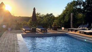 Seasonal outdoor pool, pool umbrellas, sun loungers