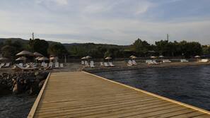 Private beach, black sand, beach bar