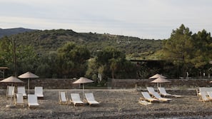 Private beach, black sand, beach bar