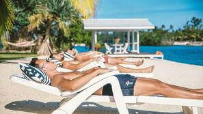 Private beach, white sand, sun-loungers, beach towels