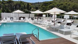 2 outdoor pools, pool umbrellas, sun loungers