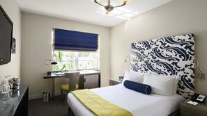 Ropa de cama de alta calidad, edredones de plumas, minibar y caja fuerte