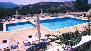 Seasonal outdoor pool, pool umbrellas, sun loungers