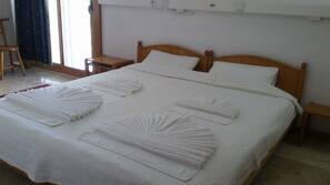 Pillowtop beds, desk, blackout drapes, iron/ironing board