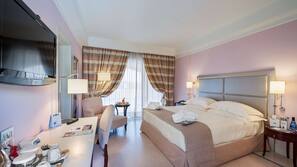 Down comforters, pillowtop beds, minibar, in-room safe