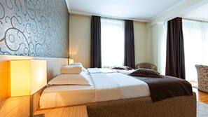 Minibar, coffre-forts dans les chambres, bureau
