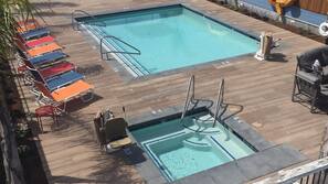 Outdoor pool, open 8:00 AM to 10:00 PM, pool umbrellas, sun loungers