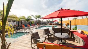 Outdoor pool, open 8:00 AM to 10:00 PM, pool umbrellas, sun loungers