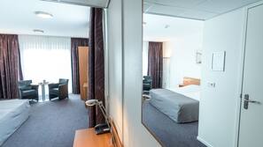 Desk, blackout curtains, free WiFi, linens