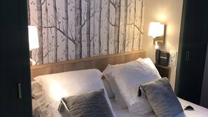 Premium bedding, desk, blackout curtains, iron/ironing board