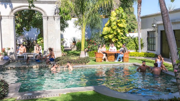 Outdoor pool, pool umbrellas, sun loungers