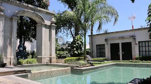 Outdoor pool, pool umbrellas, sun loungers