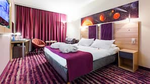 Hypo-allergenic bedding, down comforters, pillowtop beds, in-room safe