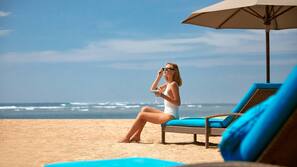 Beach nearby, white sand, free beach shuttle, sun loungers