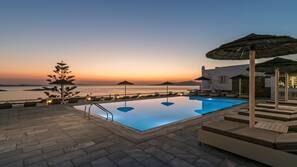 Outdoor pool, pool umbrellas, pool loungers