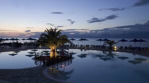 2 outdoor pools, pool umbrellas, pool loungers