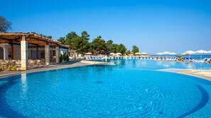 Seasonal outdoor pool, pool umbrellas, pool loungers