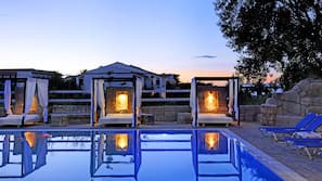 Seasonal outdoor pool, pool cabanas (surcharge), pool umbrellas