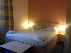 Desk, soundproofing, iron/ironing board, rollaway beds