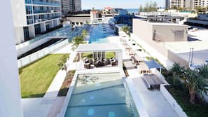 Indoor pool, 3 outdoor pools, open 6:30 AM to 10:30 PM, pool loungers