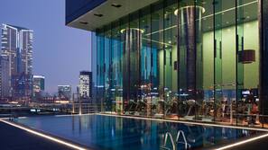 Outdoor pool, open 6:00 AM to 9:30 PM, pool umbrellas, pool loungers