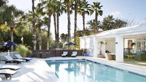 Outdoor pool, pool umbrellas, sun loungers