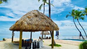 Private beach nearby, beach umbrellas, motor boating