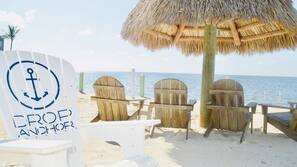 Private beach nearby, beach umbrellas, motor boating
