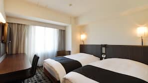 Down comforters, desk, blackout drapes, iron/ironing board