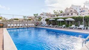 Outdoor pool, pool umbrellas, pool loungers