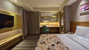 Premium bedding, down comforters, minibar, in-room safe