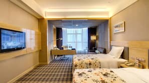 Premium bedding, down comforters, minibar, in-room safe
