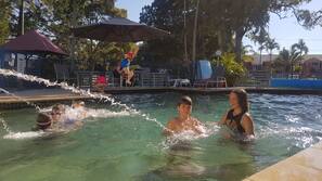 Outdoor pool, pool umbrellas, sun loungers