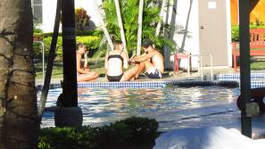 Outdoor pool, open 9 AM to 9:30 PM, pool loungers
