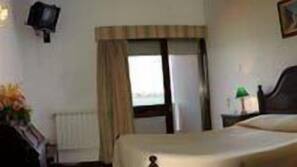 Desk, laptop workspace, blackout curtains, free WiFi
