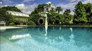 Outdoor pool, pool umbrellas, pool loungers