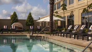 Outdoor pool, open 8:00 AM to 11:00 PM, pool umbrellas, pool loungers