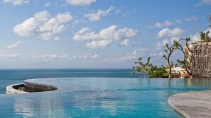 Outdoor pool, pool umbrellas, pool loungers