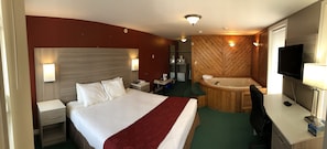 Suite, 1 King Bed, Jetted Tub | Soundproofing, iron/ironing board, free cribs/infant beds, free WiFi