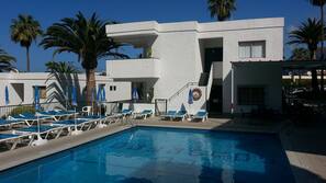 Outdoor pool, pool umbrellas, pool loungers