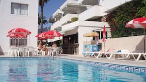 Outdoor pool, pool umbrellas, pool loungers