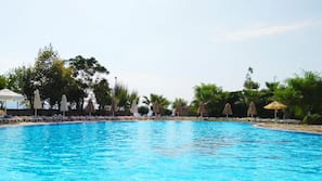Indoor pool, 3 outdoor pools, open 7:00 AM to 8:00 PM, pool umbrellas