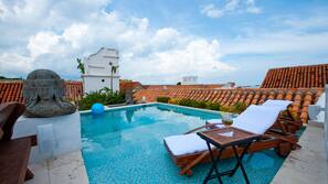 Outdoor pool, sun loungers