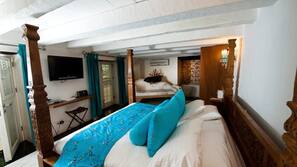 Premium bedding, down comforters, minibar, in-room safe