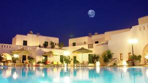 Seasonal outdoor pool, open 11 AM to 8 PM, pool umbrellas, sun loungers
