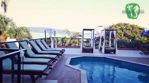 Outdoor pool, pool umbrellas, pool loungers