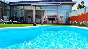 Outdoor pool, pool umbrellas, pool loungers