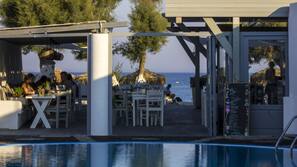 Seasonal outdoor pool, pool umbrellas, pool loungers