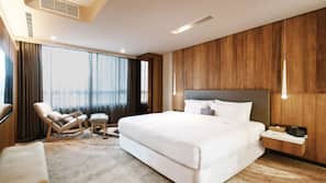 Premium bedding, down comforters, minibar, in-room safe