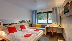 Desk, free cots/infant beds, free WiFi, linens